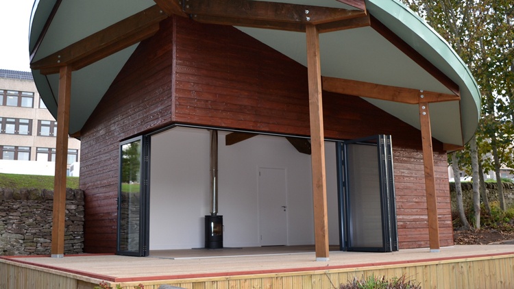 Photo of aluminum sliding doors fitted to new logo cabin holiday park
