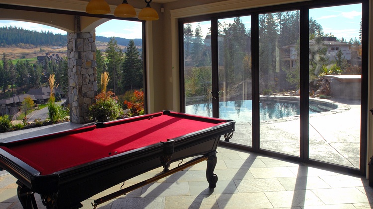 Bi-fold doors installed in a games room / pool area location