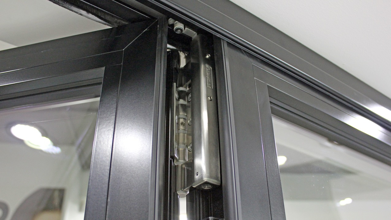 Photo of the top roller/track on a bi-fold door