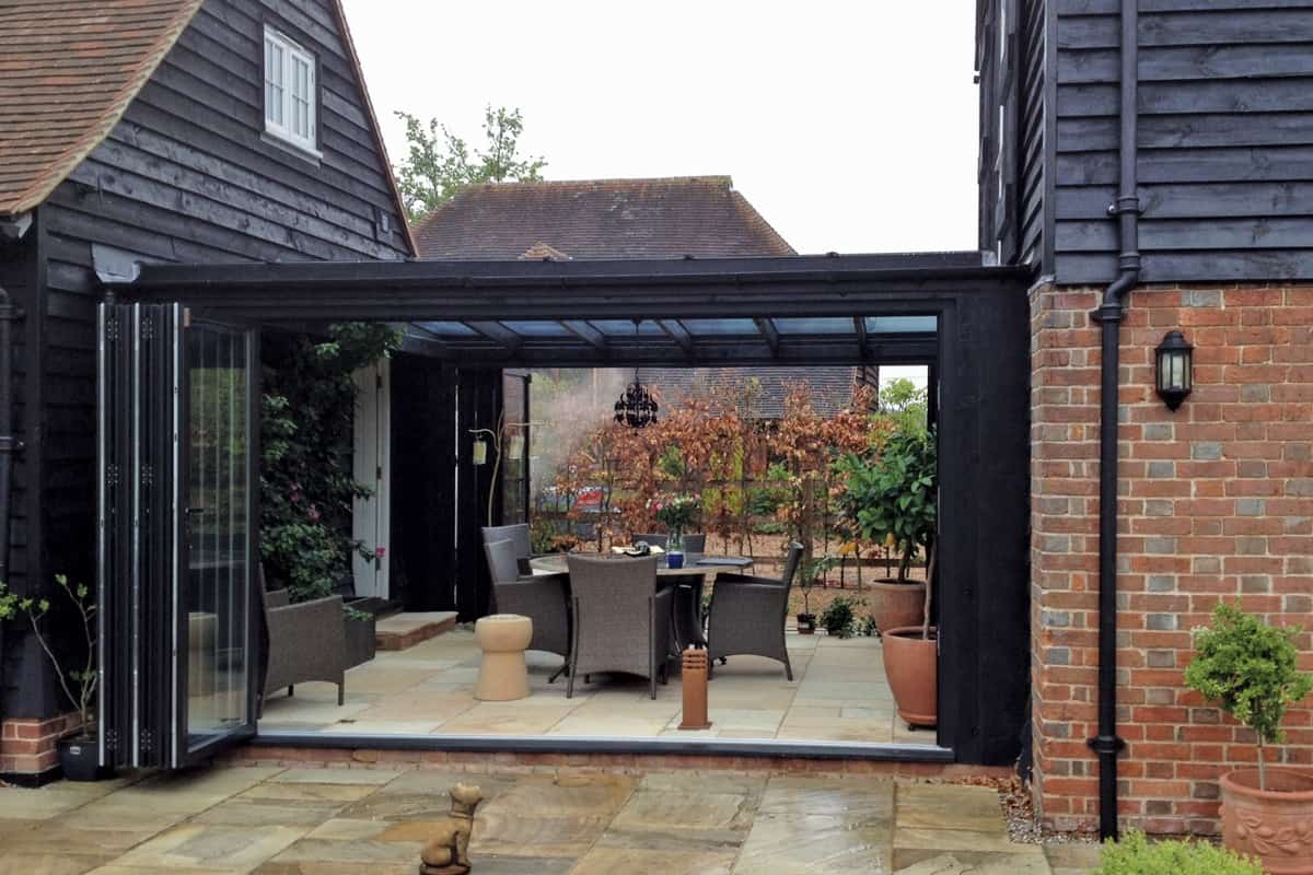 Lim stacking internal (UK) bifold doors fitted to link through extension